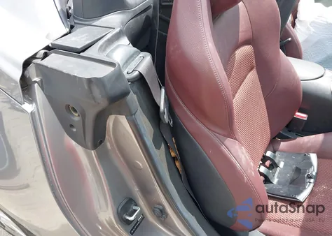 2010 Nissan 370Z Touring z USA, uszkodzony, nr VIN JN1AZ4FH4AM302516